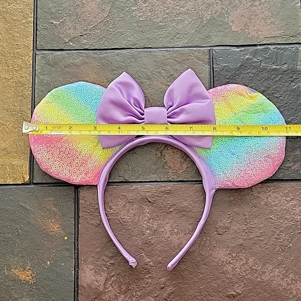 DISNEY Minnie Mouse Ears Headband, rainbow ears with a purple bow, NWOT